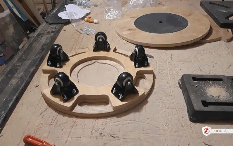 Установка опорных колес на основание фотостола